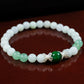 Triple Good Fortune and Confidence Bracelet - AAA African Jade, AAA Burmese Jade, and AAA Green Aventurine with .925 Sterling Silver Floral Bead