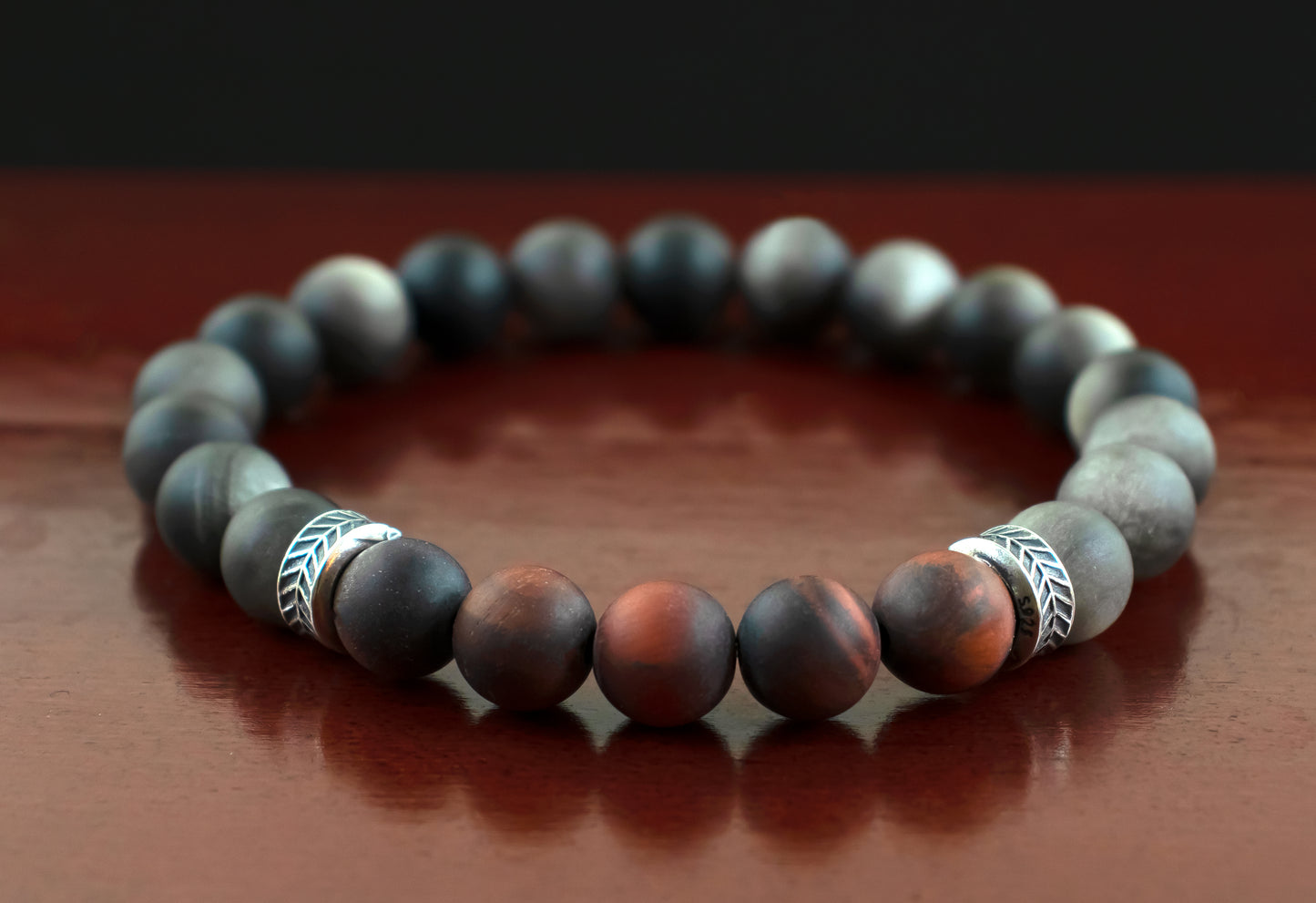 Protection/Strength - A Quality Matte Mahogany Red Tiger’s Eye/ AAA Quality Matte Silver Obsidian/.925 Sterling Silver Accents - 8mm