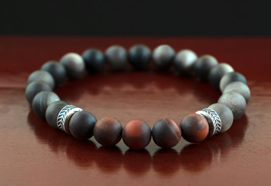 Protection/Strength - A Quality Matte Mahogany Red Tiger’s Eye/ AAA Quality Matte Silver Obsidian/.925 Sterling Silver Accents - 8mm