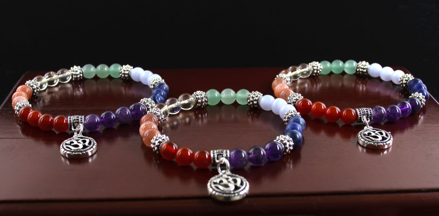 Chakra bracelet/AAA+ Quality Gemstones/.925 Sterling Silver OM charm and Bail with .925 Sterling Silver Accents