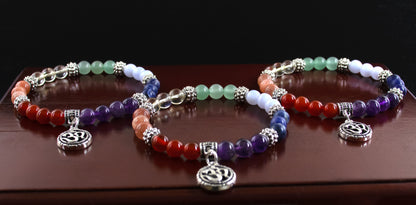 Chakra bracelet/AAA+ Quality Gemstones/.925 Sterling Silver OM charm and Bail with .925 Sterling Silver Accents