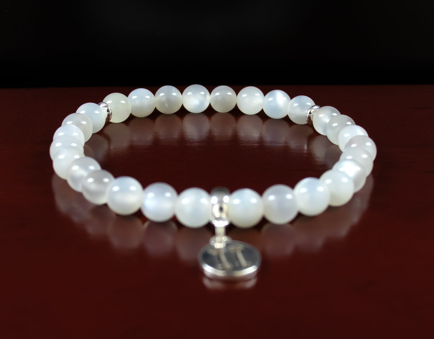 Gemini - AAA Quality Natural White Moonstone Accented with .925 Sterling Silver w/Charm - 6mm